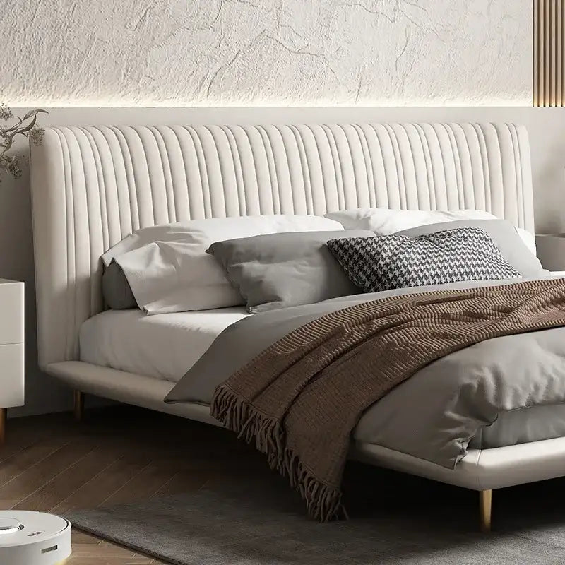 Luxury Bed with a Ribbed Headboard and Soft Bedding in a Modern Bedroom Setting