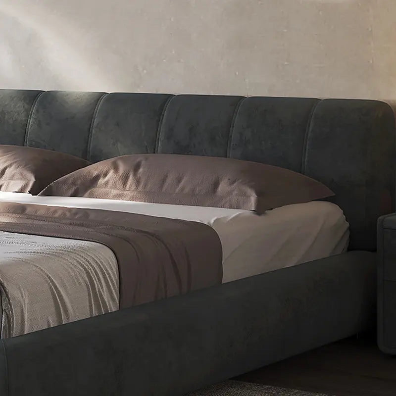Nisu Home Luxury Bed with a plush upholstered headboard and soft bedding in a stylish interior