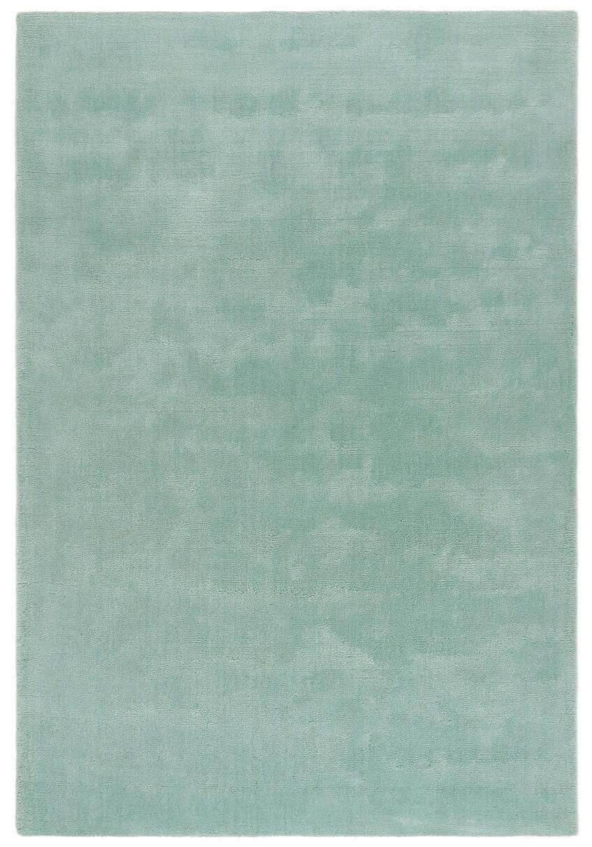 Soft luxury rug in soothing light green colour for elegant home decor