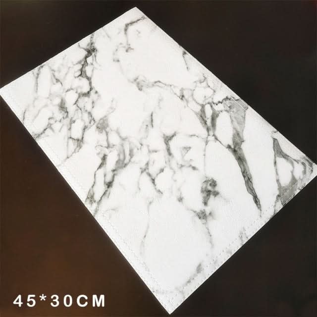 Elegant white marble placemats from Kitchen Essentials for enhancing dinnerware settings