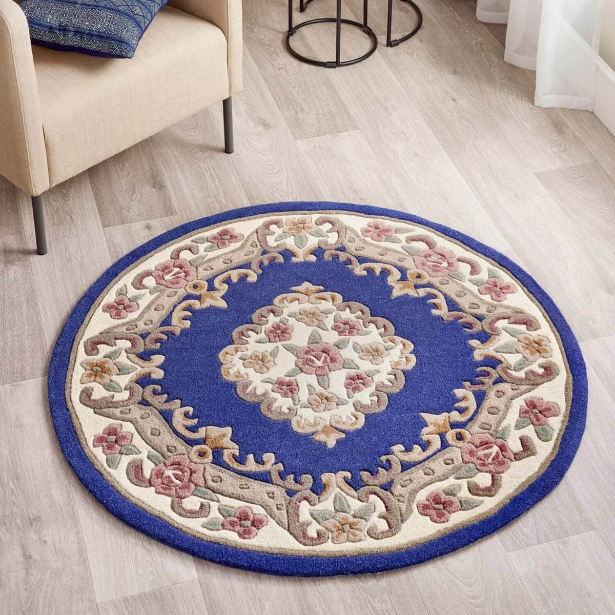 Elegant Medallion Rug featuring intricate floral patterns in rich blue and cream tones