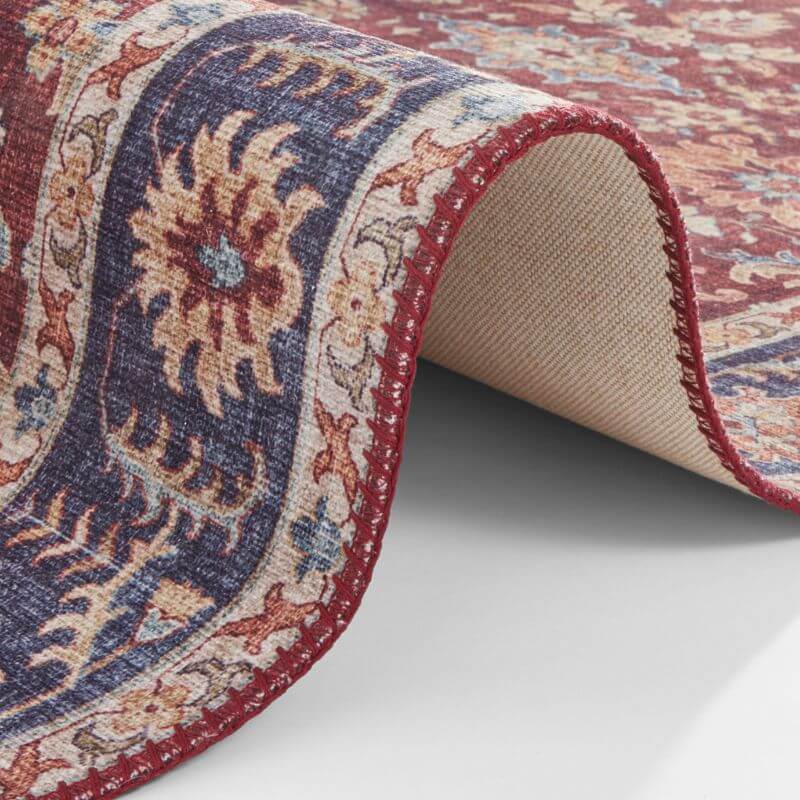 Close-up of a Medallion Rug featuring intricate floral patterns and vibrant colours
