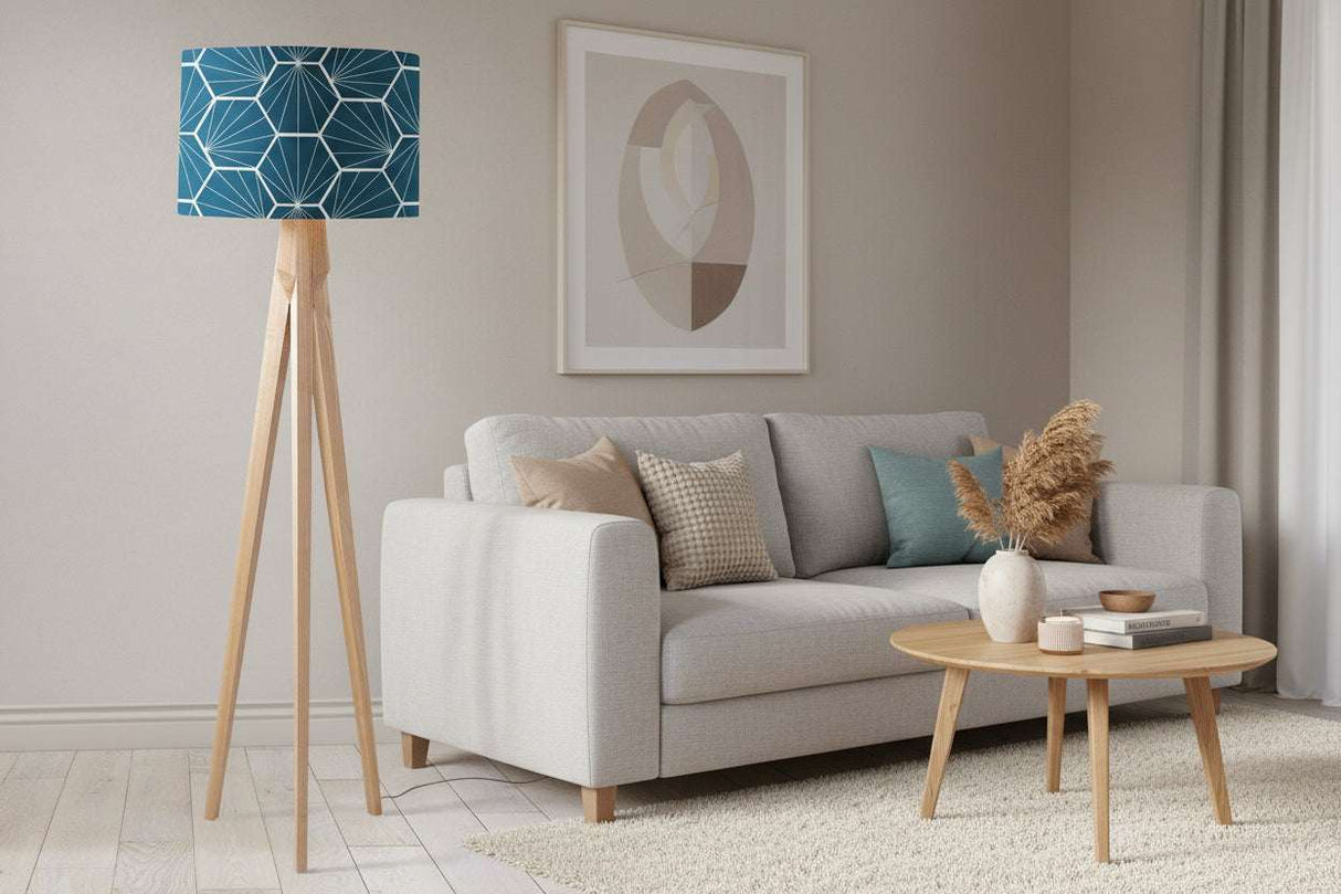 Geometric pattern blue lampshade on a stylish wooden floor lamp in a modern living room