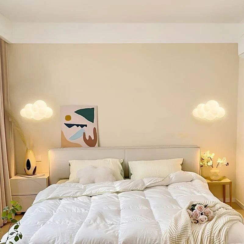 Light My House Wall Lamp in a soft cloud design illuminating a modern bedroom decor