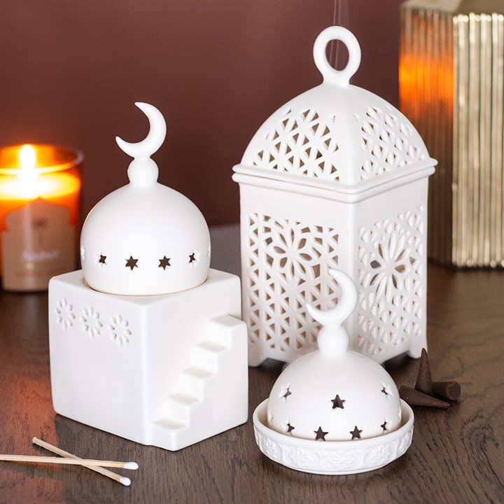 Three decorative ceramic lamps featuring a moon design, perfect for use as a multi-purpose burner