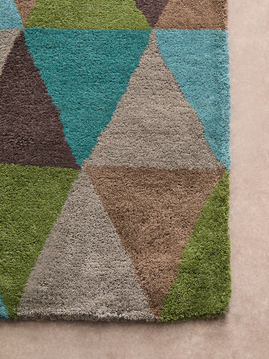 Orsina Multicoloured Rug with a geometric pattern featuring vibrant triangles in various colours