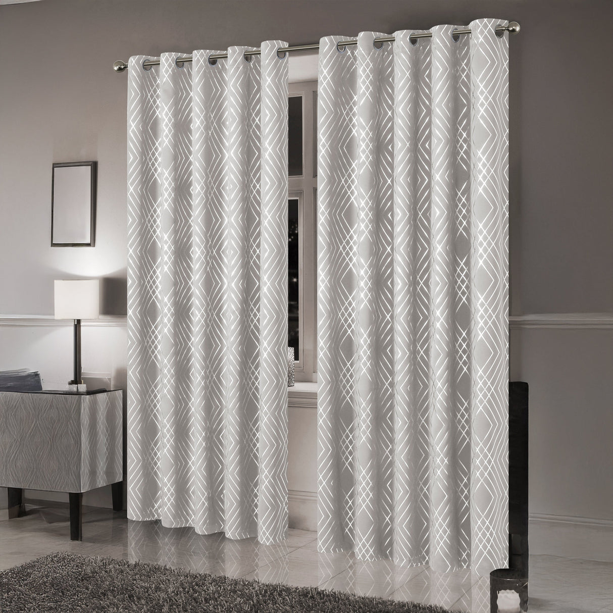 Olivia Rocco stylish blackout curtains in geometric pattern, perfect for light-blocking and privacy