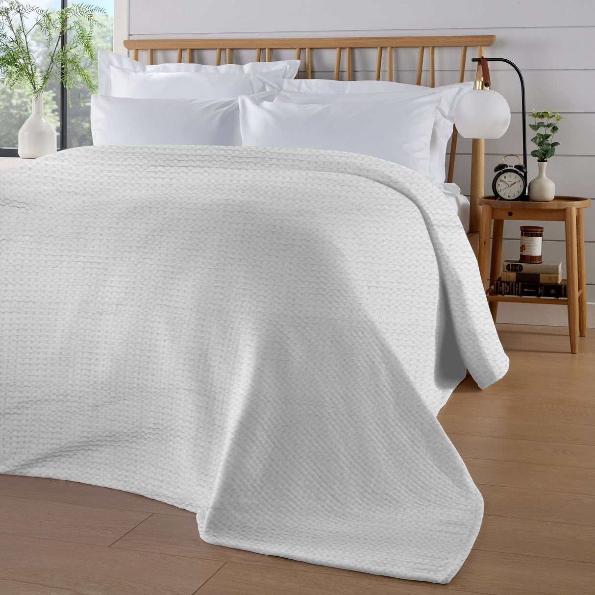 OLIVIA ROCCO Throw Blanket in soft white, perfect for adding warmth and style to any living space