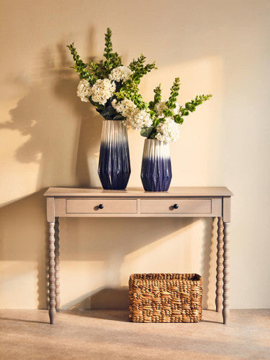 Orsina Ombre Vase set with elegant floral arrangements displayed on a stylish console table