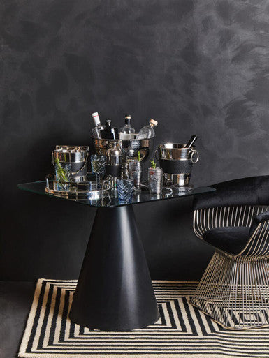 Stylish Orsina wine bucket collection on a glass table with drinks and elegant accessories