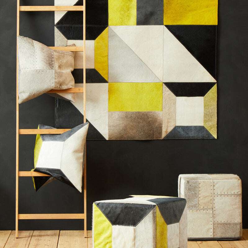 Orsina Patchwork Cushion in vibrant colours displayed on a wooden ladder and stylish decor