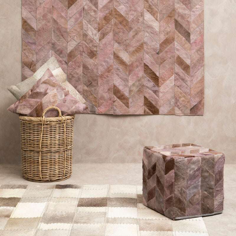 Orsina Patchwork Cushion in soft hues, perfect for adding a cosy touch to your living space