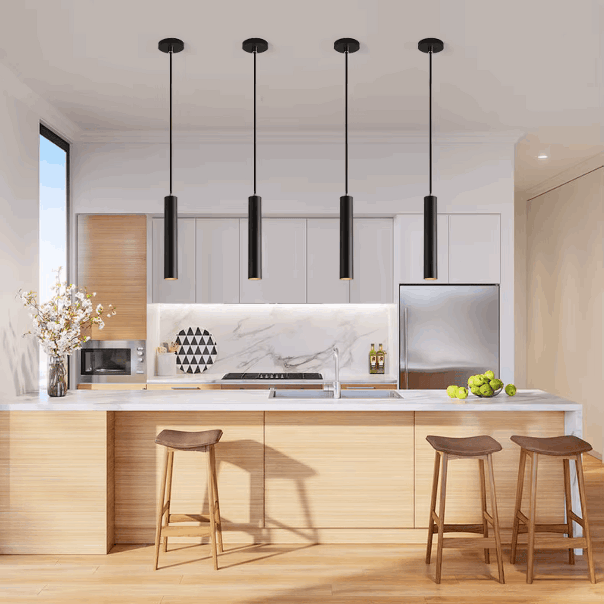 Modern kitchen with four black pendant lights hanging over a wooden countertop