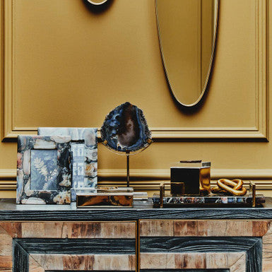 Orsina decorative photo frame displayed on a stylish surface with agate and gold accents