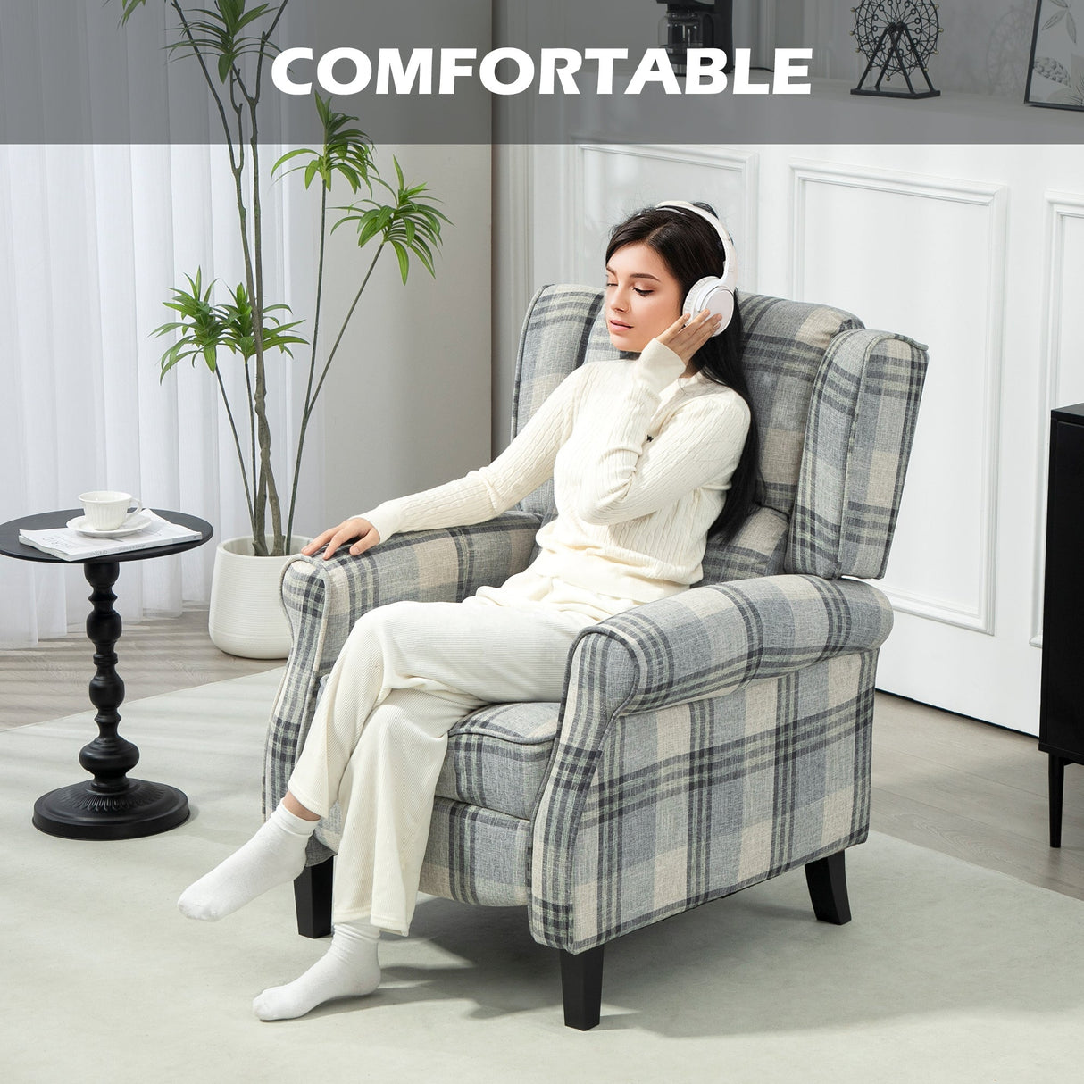 Comfortable reclining armchair in plaid fabric design for relaxation and leisure
