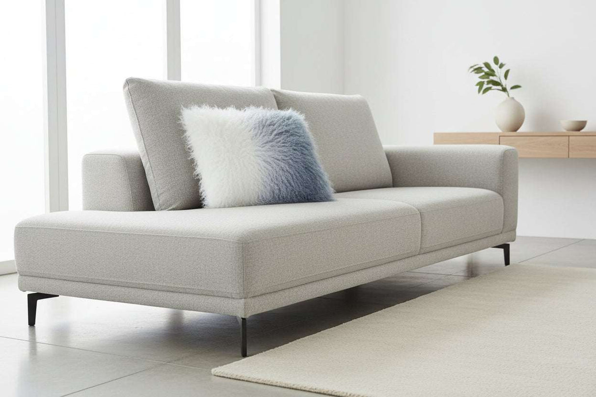 Orsina Rectangular Cushion in soft grey and blue on a modern sofa for stylish home decor