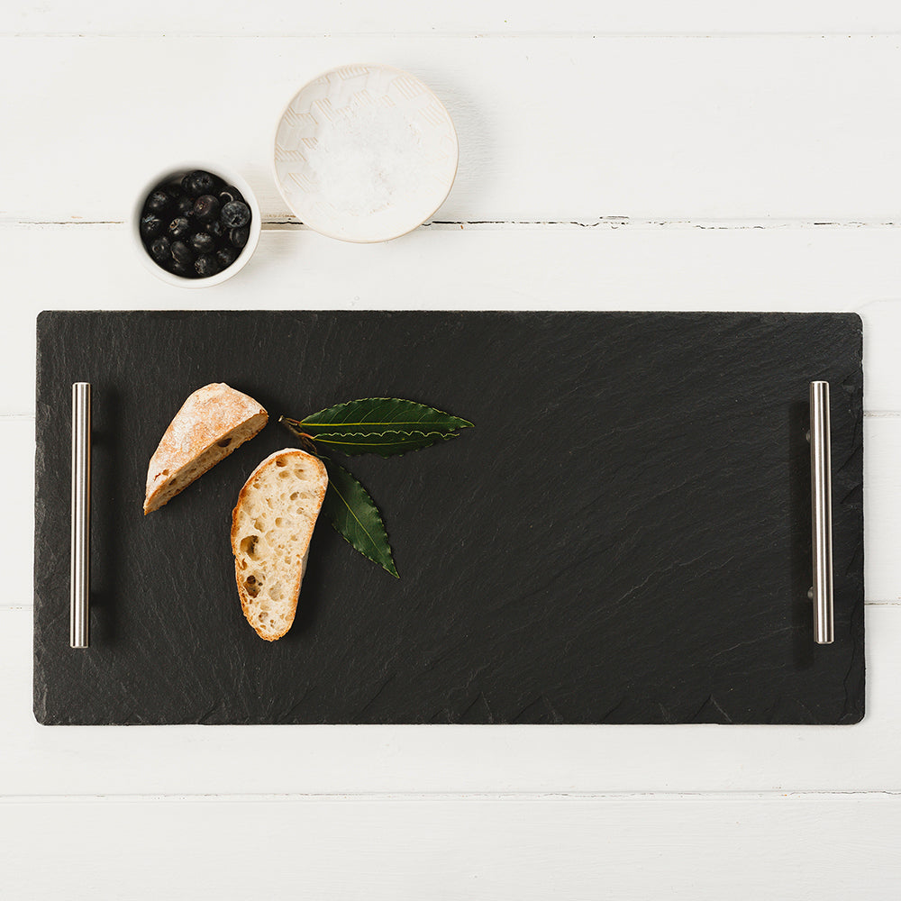 Selbrae House Slate Serving Tray with Stainless Steel Handles, styled with bread and bowls of berries and salt