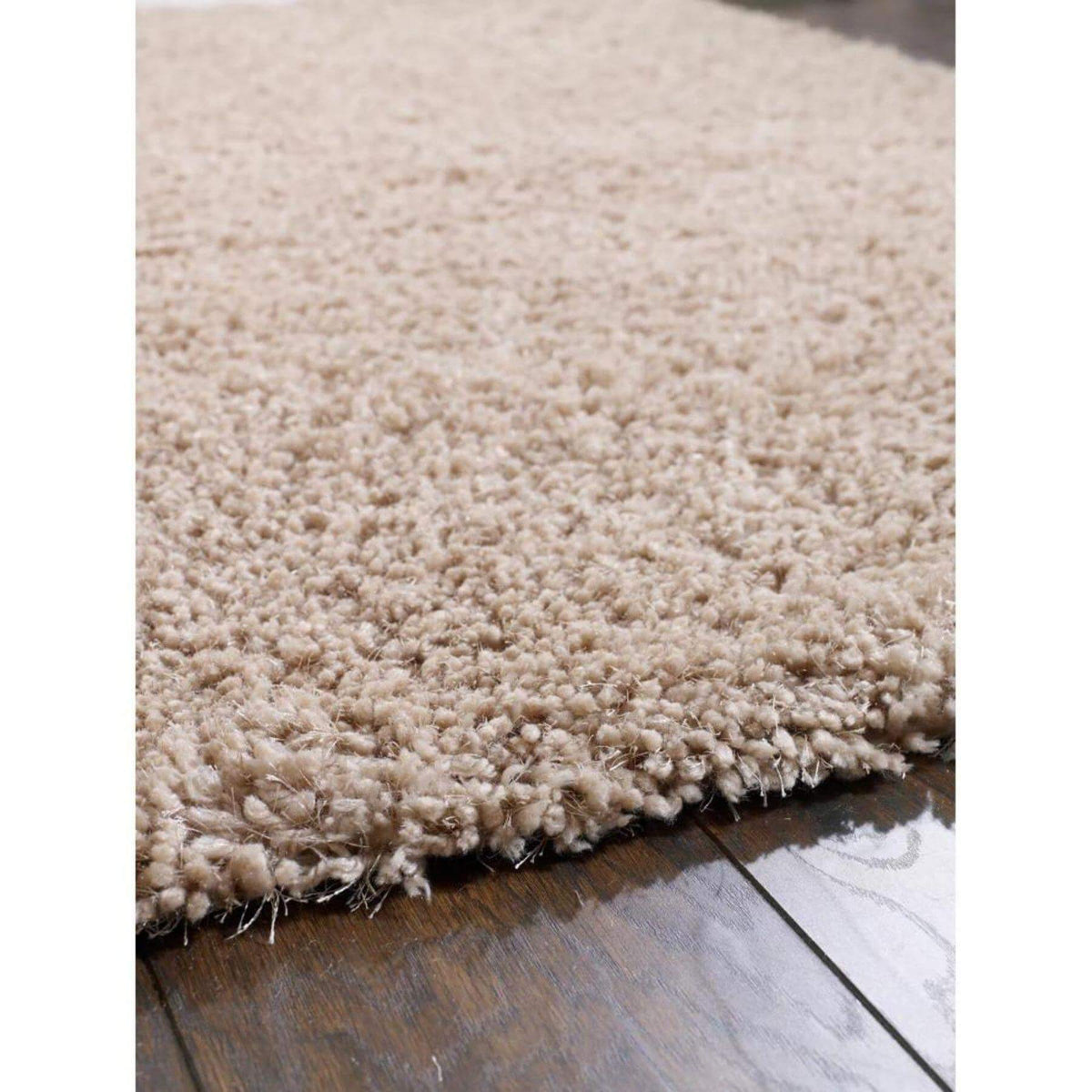 Soft beige Shaggy Rug with a plush texture, perfect for adding comfort to any room