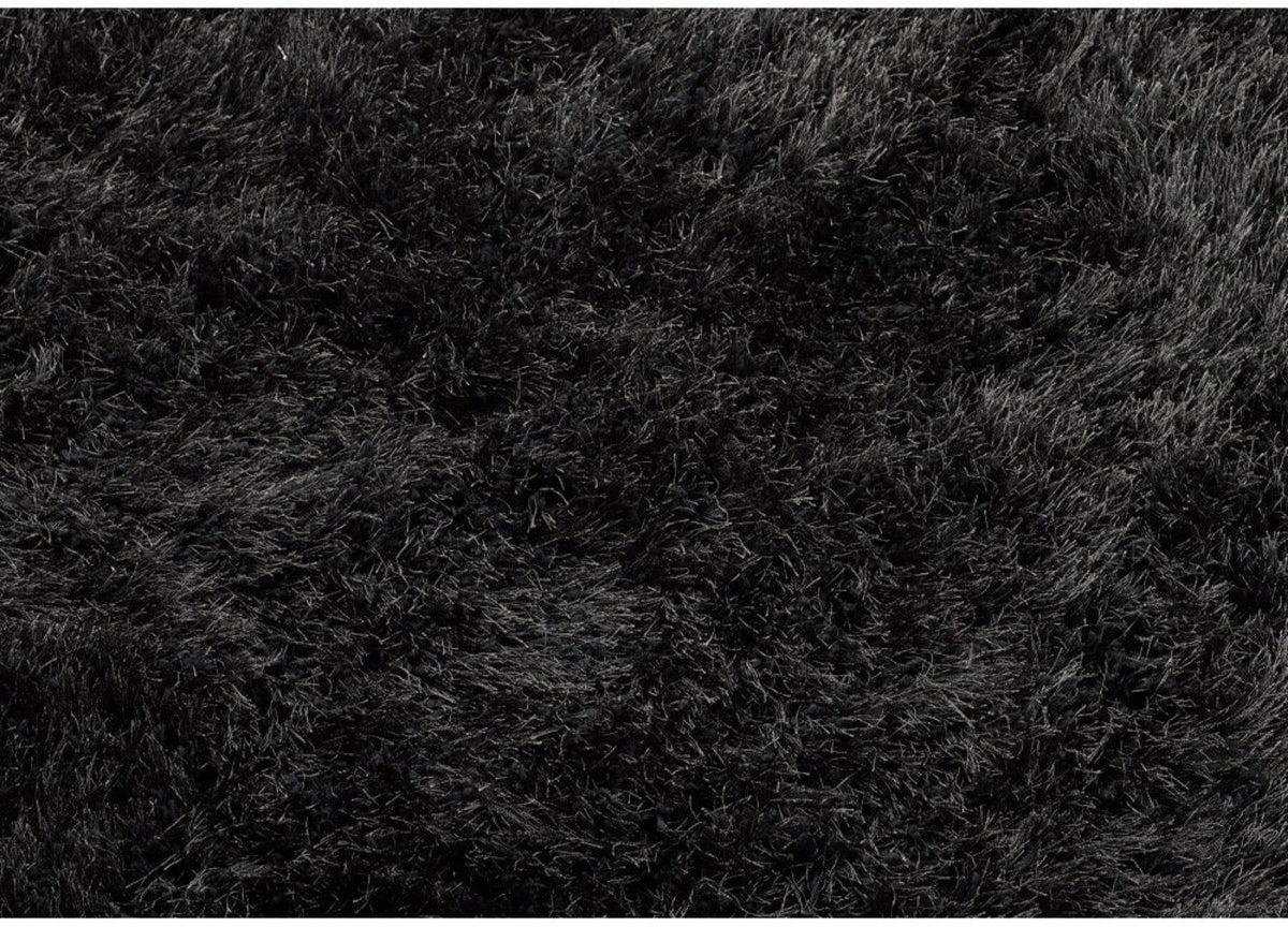 Luxurious black shaggy rug with a soft, plush texture for stylish home decor