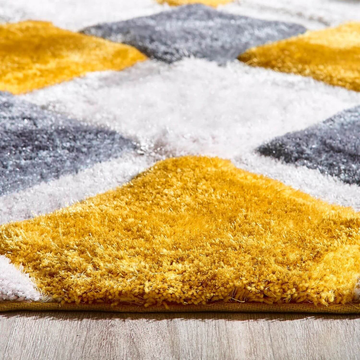 Colourful geometric shaggy rug with yellow and grey patterns, perfect for enhancing any room
