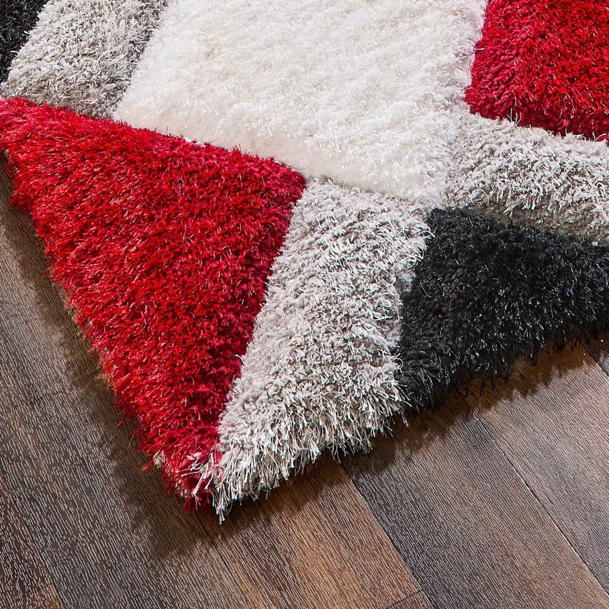 Colourful Shaggy Rug featuring red, grey and white geometric patterns for a stylish home decor