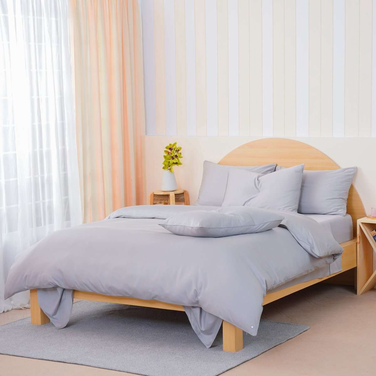 SHEET STORY Duvet Cover Set in grey on a modern bed with soft pillows and minimalist decor