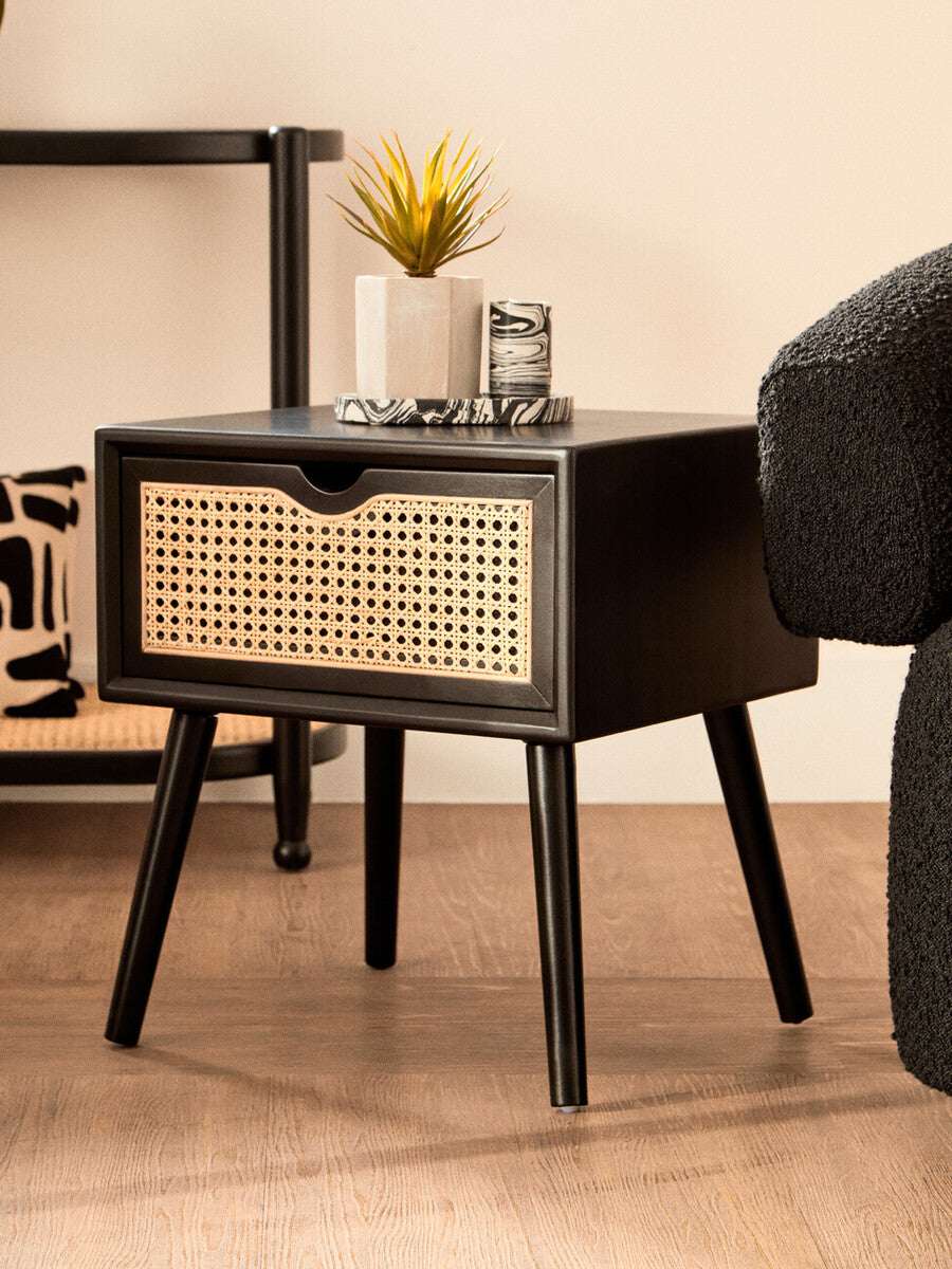 Orsina Side Table in black with woven gold drawer and stylish legs for modern interiors