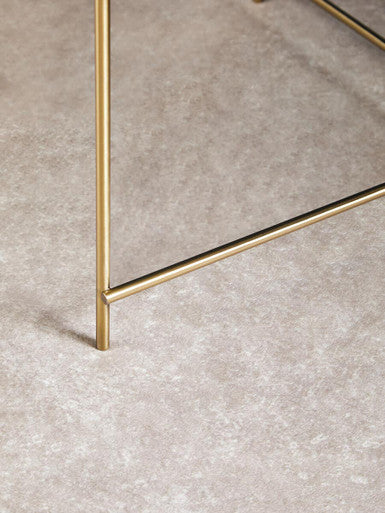 Elegant Orsina Side Table with a sleek metal frame and minimalist design for modern interiors