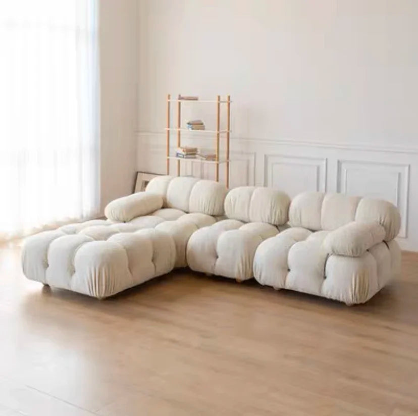 Contemporary Nisu Home Sofa in Soft Beige Fabric with Plush Cushions for Comfortable Seating