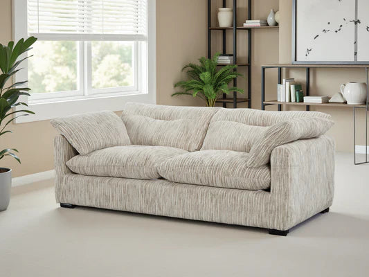Stylish beige sofa with plush cushions perfect for modern living rooms by Furniture Discount