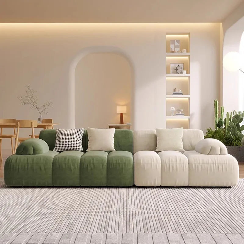 Nisu Home modern sofa in green and cream with plush cushions for stylish living spaces