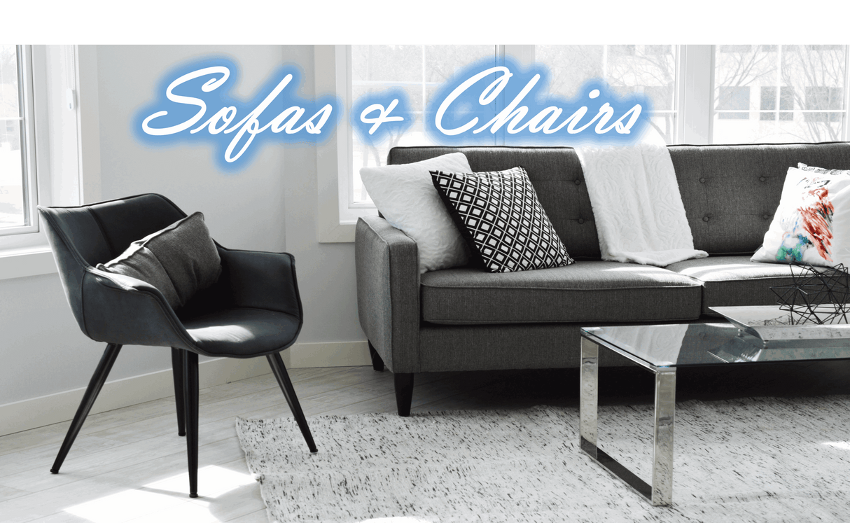 Stylish Orsina Velvet Chair in a modern living room setting beside a grey sofa