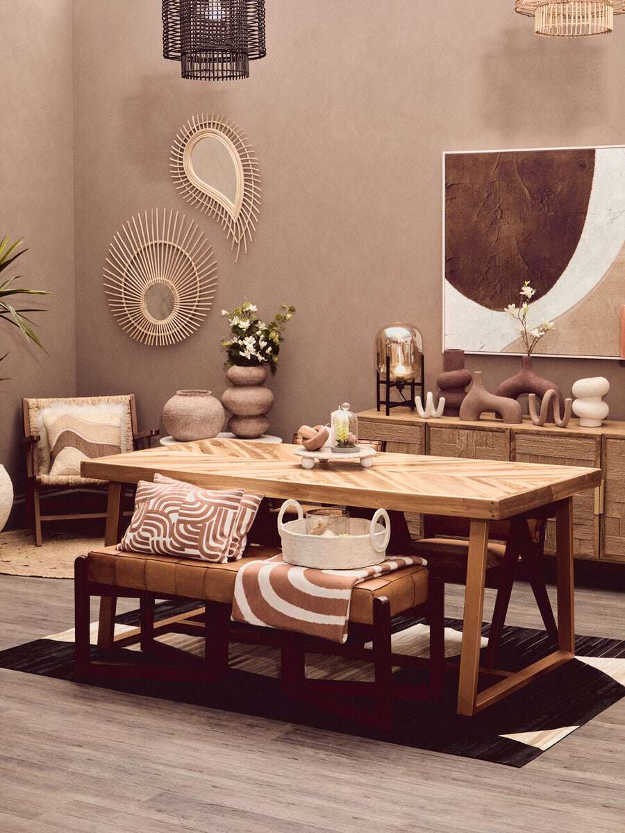 Elegant square cushion from Orsina, enhancing a stylish dining table setting