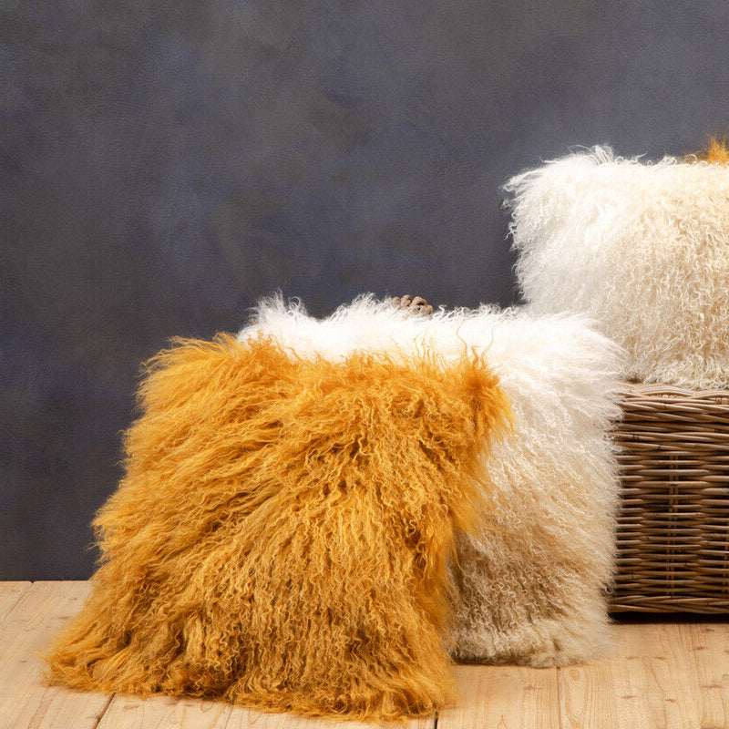 Orsina square cushion in orange and white soft texture, perfect for home decor and comfort