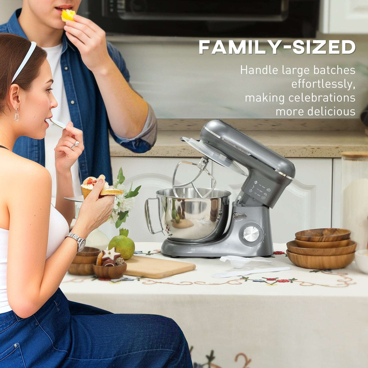 Wise Galleria Stand Mixer in a kitchen with a woman enjoying dessert and preparing food