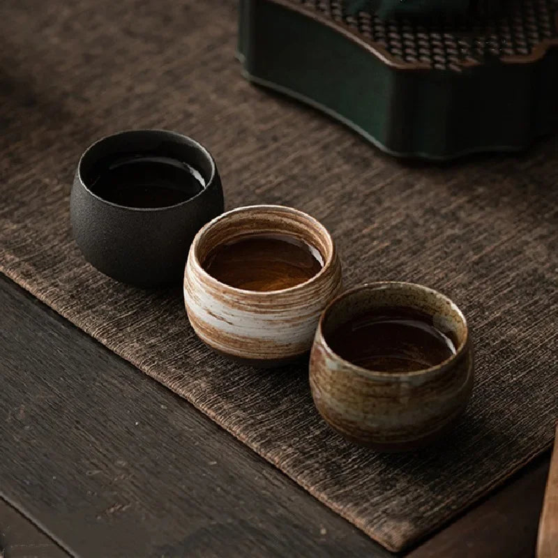 Set of three Nisu Home Stoneware Mugs crafted with unique designs for tea or coffee