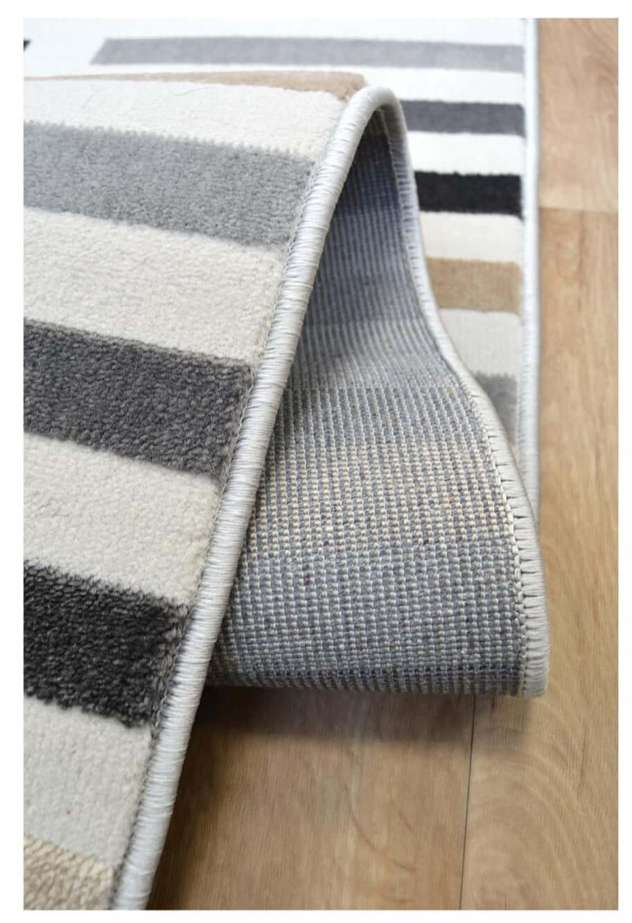Close-up of a Stripe Rug featuring a soft texture and stylish design, perfect for modern interiors