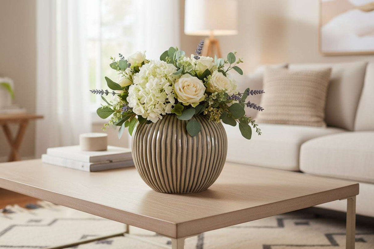 Striped Vase showcasing fresh flowers on a coffee table in a stylish living room