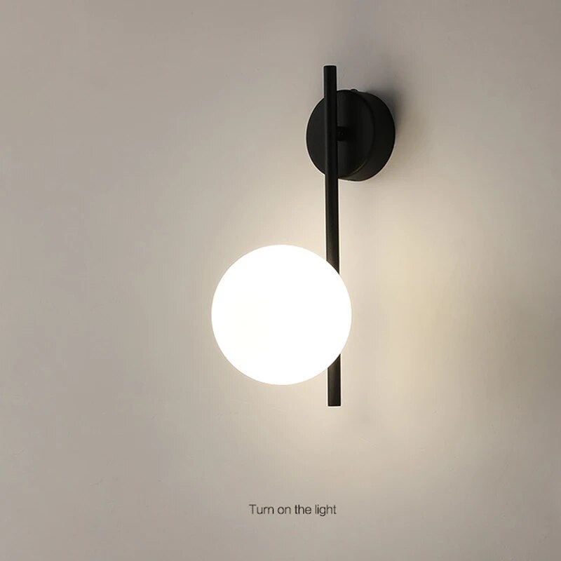 Light My House Modern Wall Lamp with Round Glass Shade and Black Metal Bracket