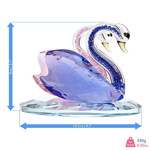 Elegant crystal swan figurine with dual swans and vibrant purple and pink details