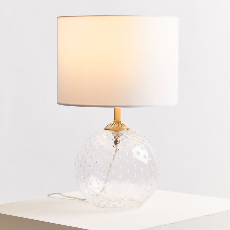 Orsina Table Lamp with a clear globe base and white shade, ideal for modern interiors