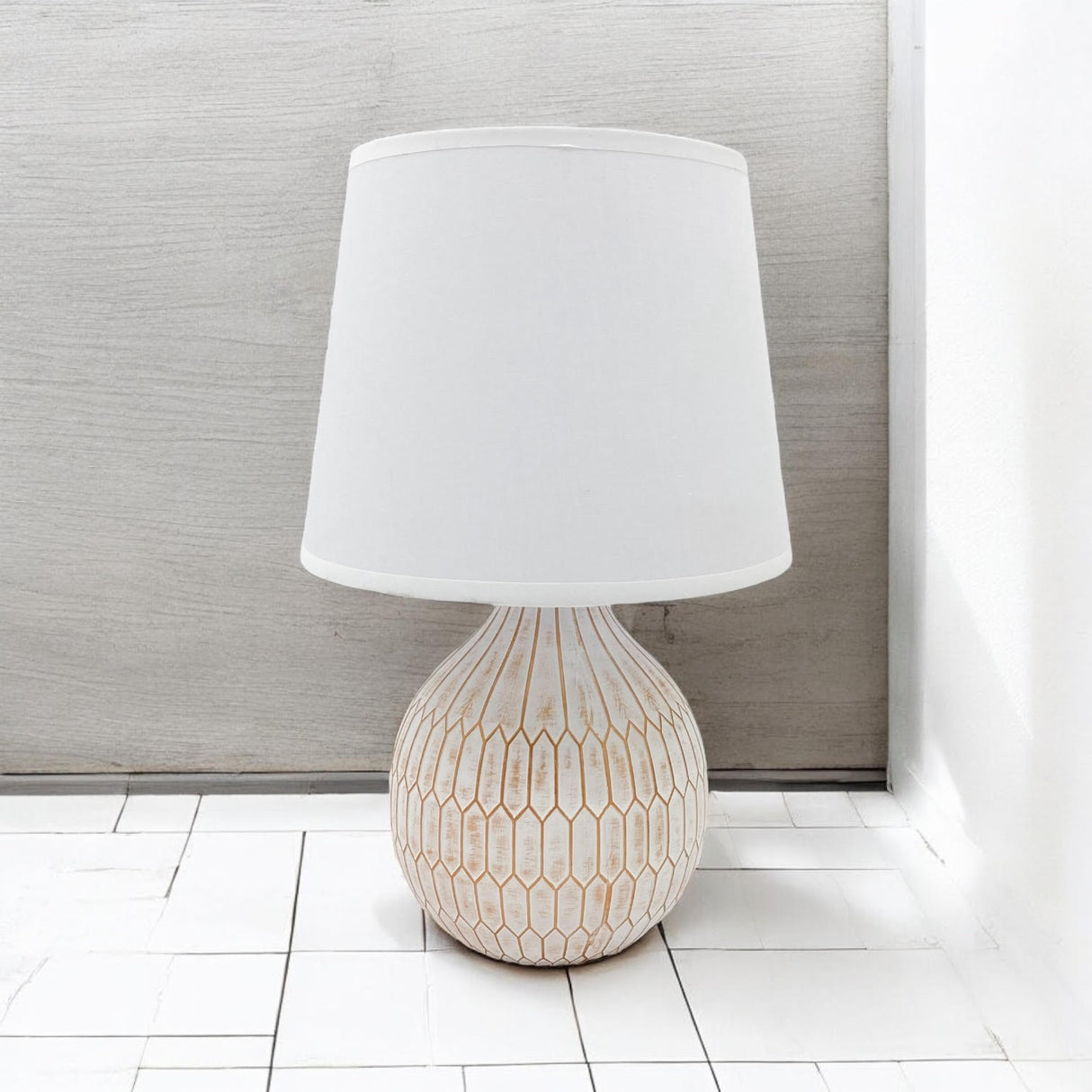 Elegant MSL Table Lamp with a textured base and white lampshade, perfect for home decor