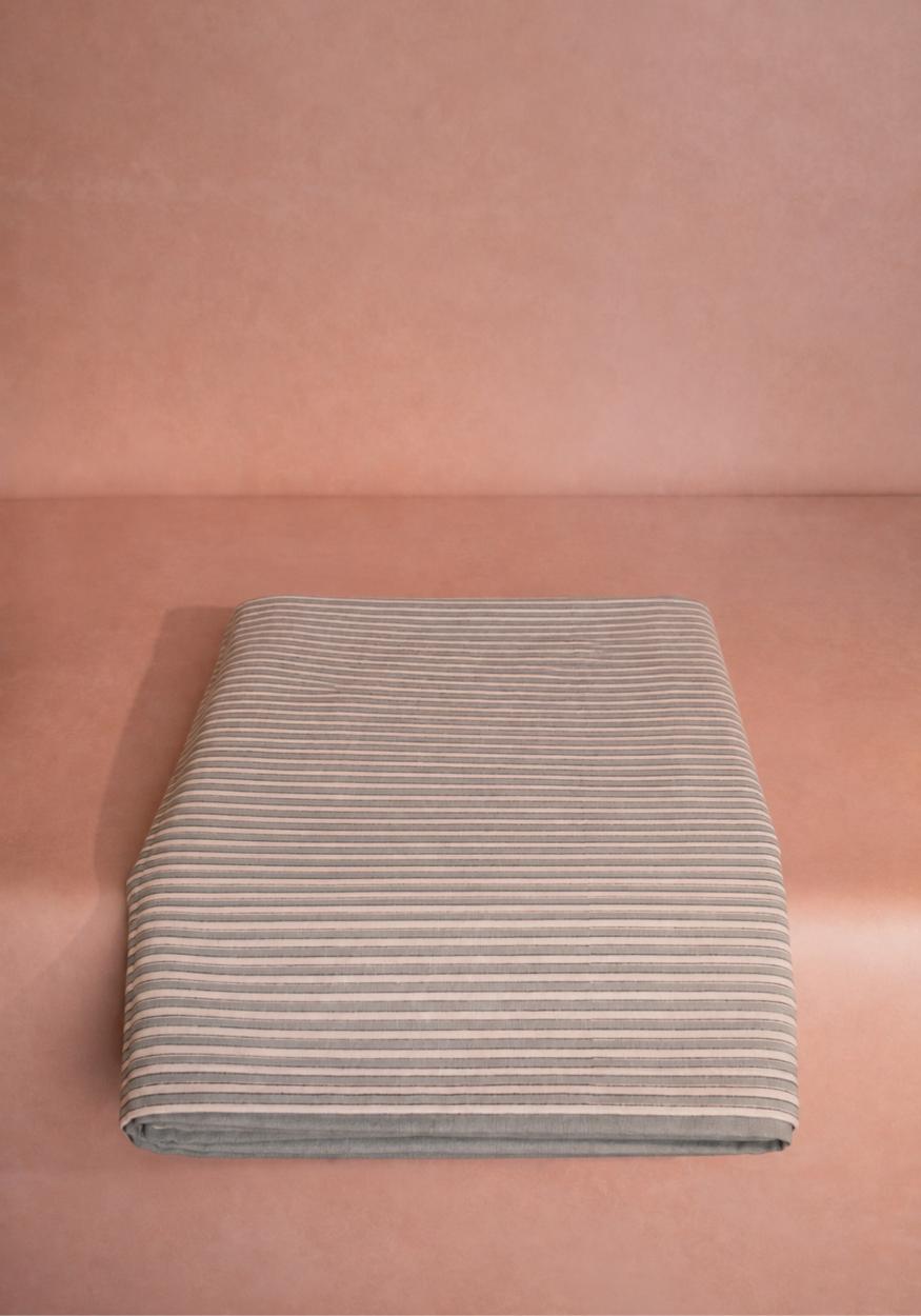 Casa by Josephine Jenno striped tablecloth in neutral tones, ideal for elegant dining settings