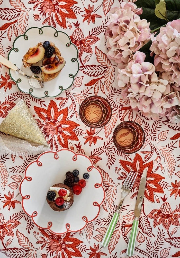 Casa by Josephine Jenno Side Plates on a vibrant floral tablecloth with desserts and fresh berries