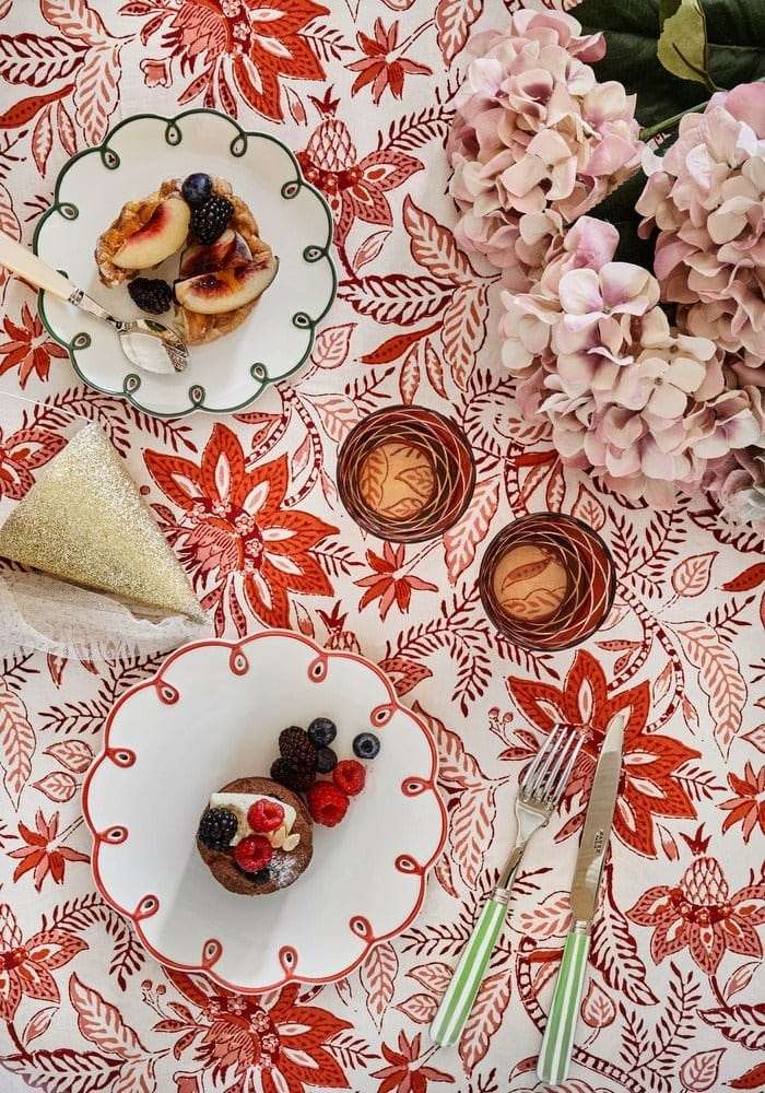 Casa by Josephine Jenno Side Plates on a vibrant floral tablecloth with desserts and fresh berries