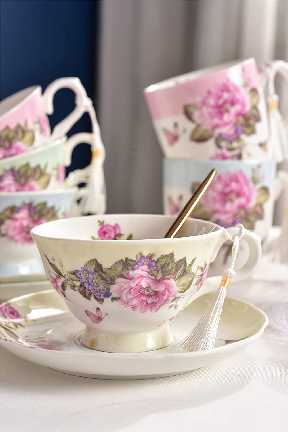 Elegant tea cup with floral design and matching saucer from London Boutique Lifestyle