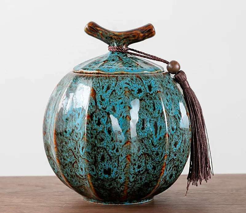 Nisu Home Tea Jar in turquoise with a unique textured finish and decorative tassel