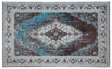 Orsina Teal Rug with intricate patterns and a blend of teal and brown for a stylish home decor