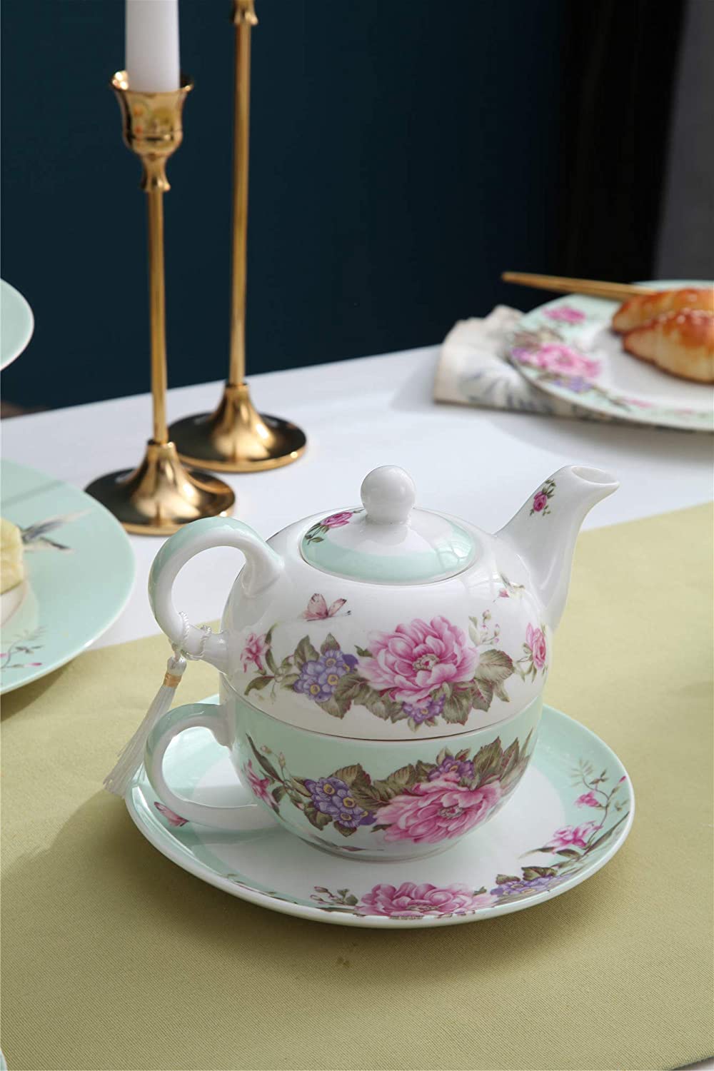 Elegant London Boutique Lifestyle teapot with floral design and matching saucer, perfect for afternoon tea