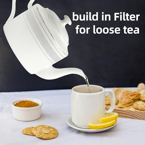 Elegant Teapot Set with Built-in Filter, pouring tea into a cup with cookies and lemon slices